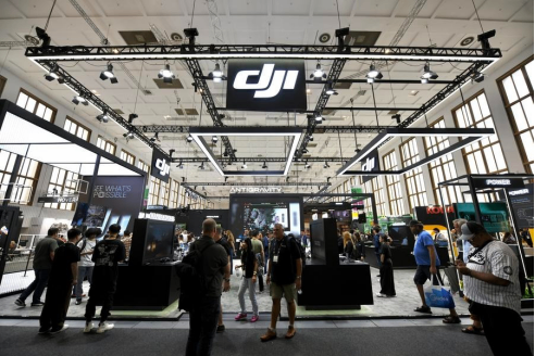 A CALIFORNIA GROUND SQUIRREL IN CONTA COSTA COUNTY RUNS WITH A VOLE IT HUNTED IN ITS MOUTH.