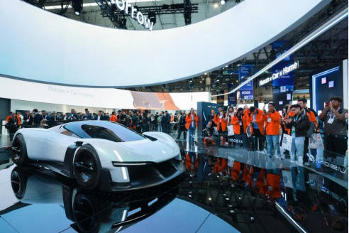 A CALIFORNIA GROUND SQUIRREL IN CONTA COSTA COUNTY RUNS WITH A VOLE IT HUNTED IN ITS MOUTH.